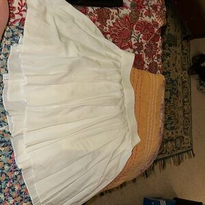White pleated tennis skirt